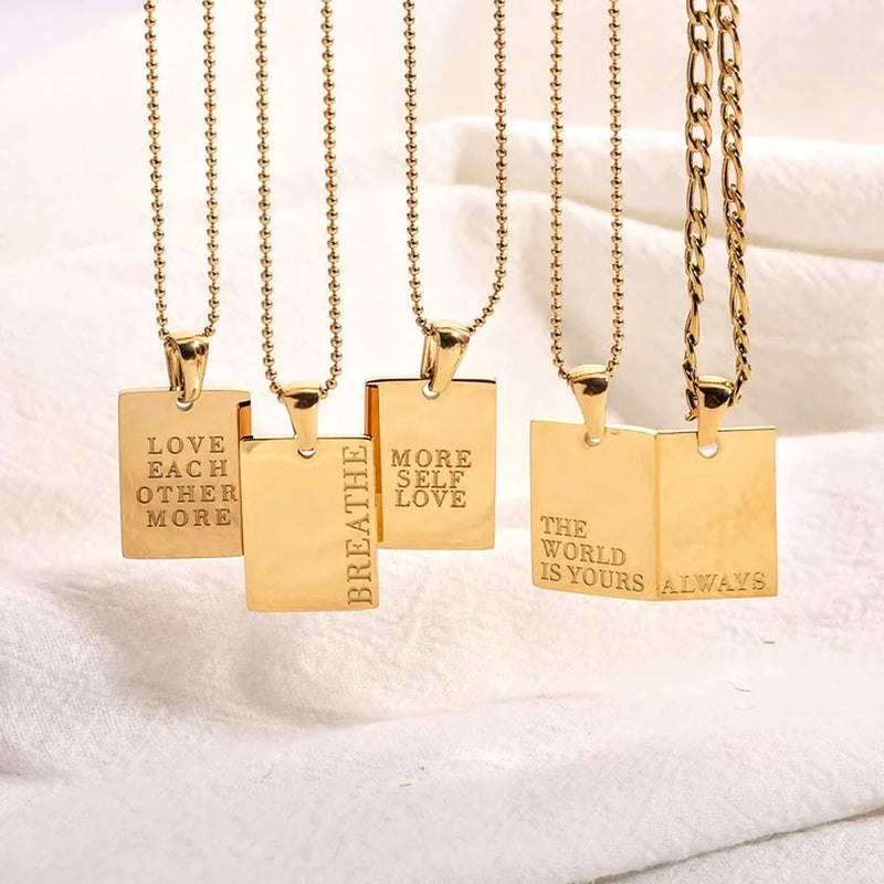 THE WORLD IS YOURS PLATE NECKLACE